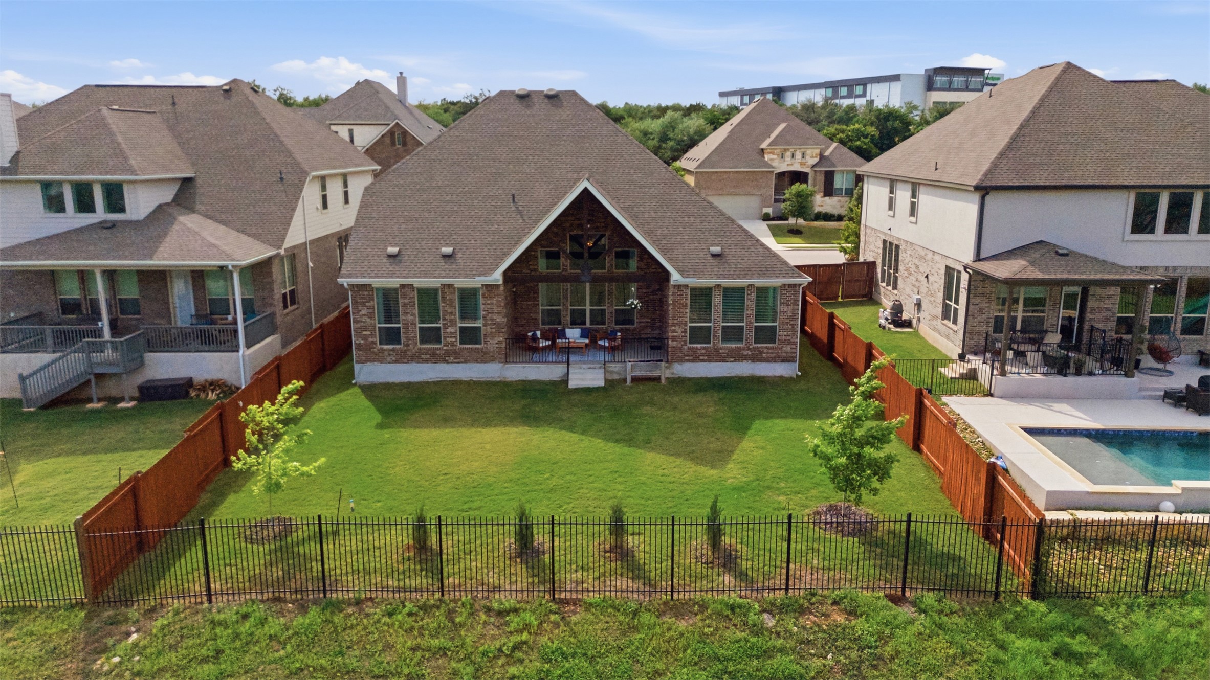 118 Bear Paw Run Georgetown, TX 78628 - Photo 27 of 35 The property features a well-maintained lawn and a private patio area, ideal for outdoor enjoyment
