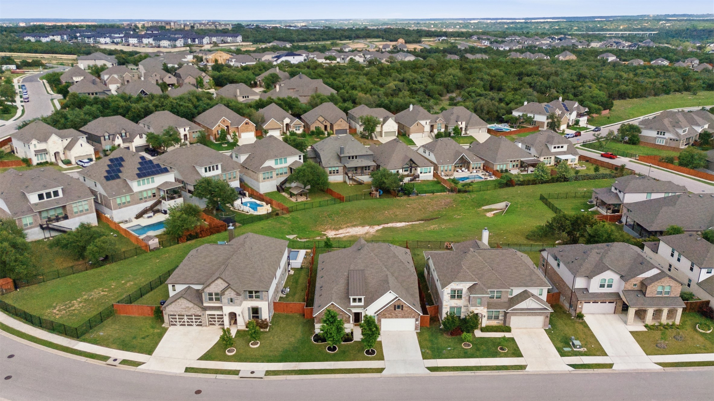118 Bear Paw Run Georgetown, TX 78628 - Photo 28 of 35 Aerial view of a residential neighborhood with numerous properties featuring varied architectural styles and rooflines