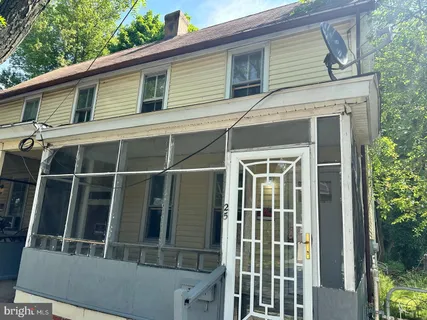 a front view of a house with a window