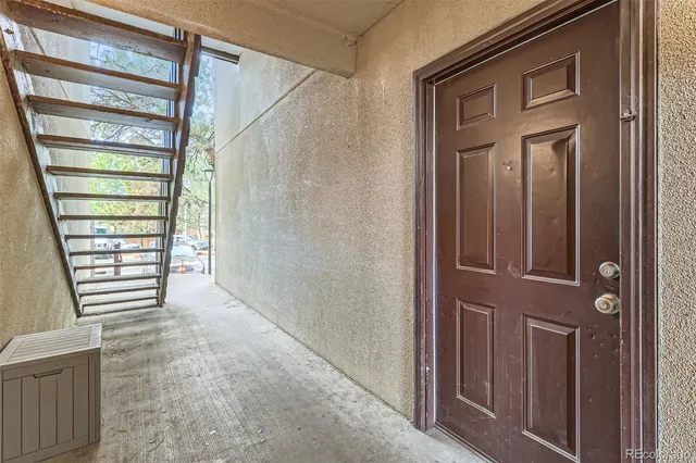 a view of entryway with a front door