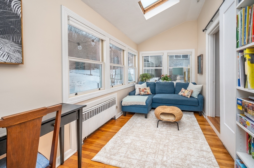 40 Waldorf Road Newton, MA 02461 - Photo 11 of 29 a living room with furniture and a rug