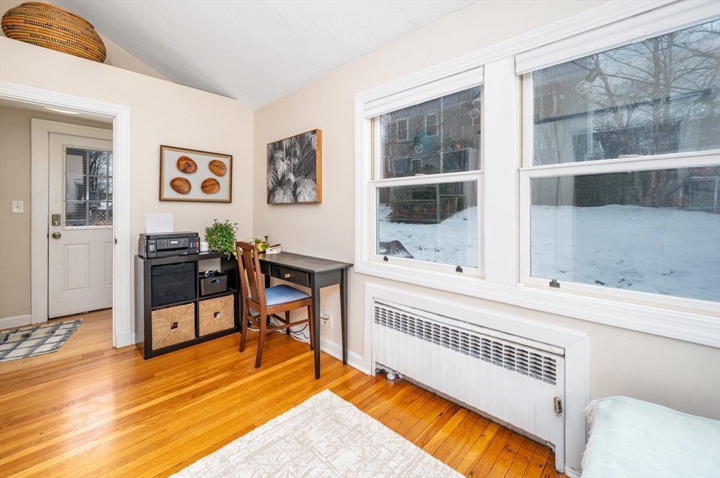 40 Waldorf Road Newton, MA 02461 - Photo 12 of 29 a view of a livingroom with furniture and a window
