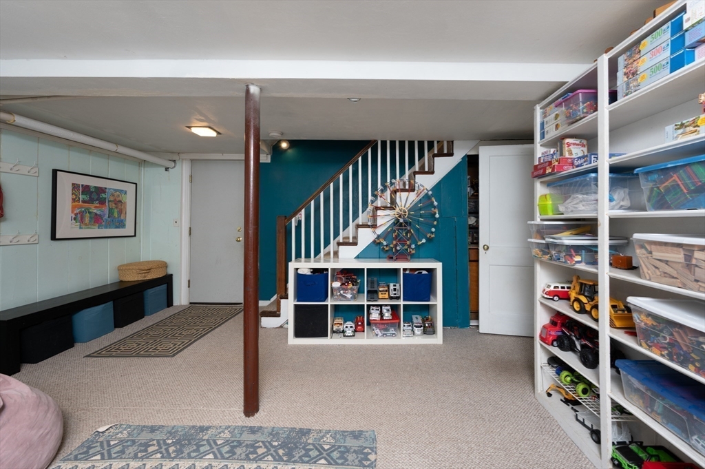 40 Waldorf Road Newton, MA 02461 - Photo 23 of 29 a view of an empty room with shelves