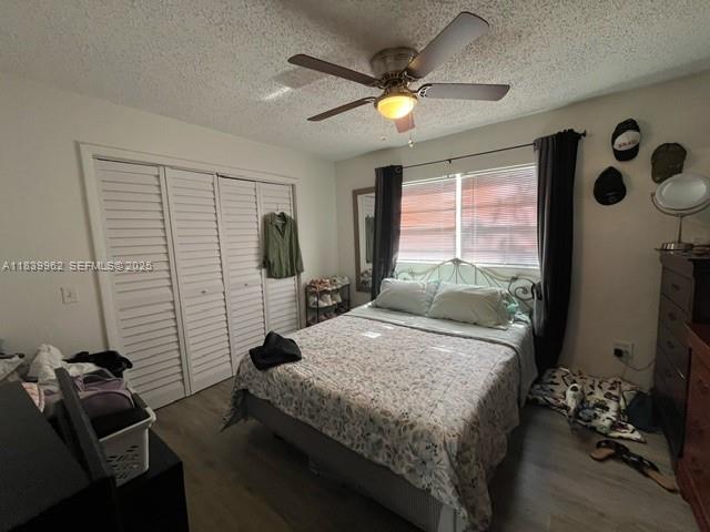 7230 Northwest 3rd Street Miami, FL 33126 - Photo 12 of 28 a bedroom with a bed and furniture