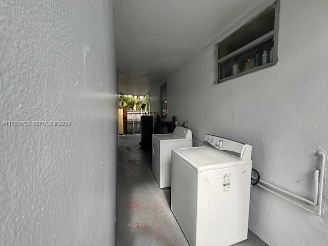 7230 Northwest 3rd Street Miami, FL 33126 - Photo 2 of 28 a utility room with dryer and washer