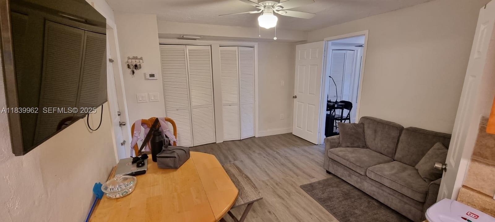 7230 Northwest 3rd Street Miami, FL 33126 - Photo 6 of 28 a view of a livingroom with furniture and windows