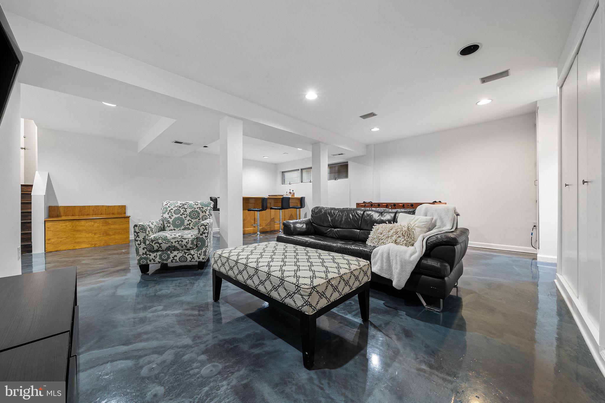 7805 Wendy Ridge Lane Annandale, VA 22003 - Photo 49 of 68 New Stained Concrete Flooring