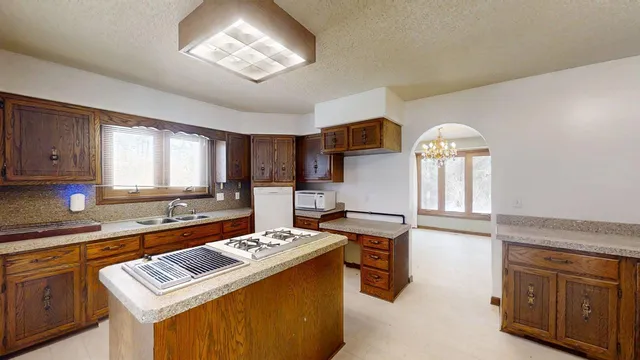a view of empty room with cabinet