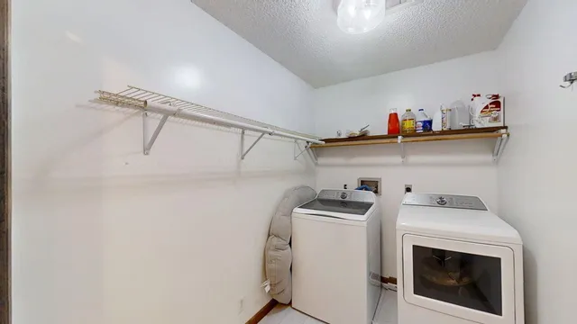 a view of a livingroom with a staircase