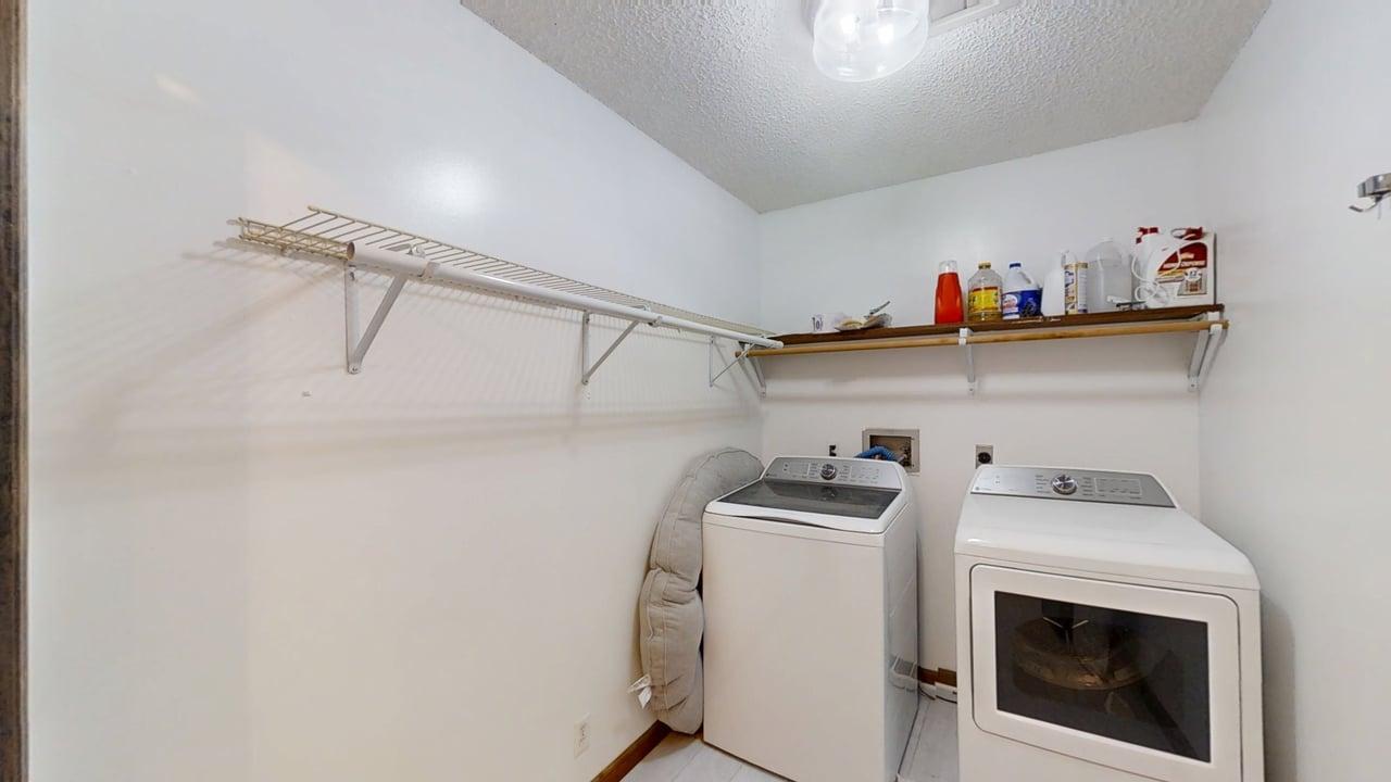 1756 West Ravina Park Road Decatur, IL 62526 - Photo 21 of 47 a utility room with dryer and washer