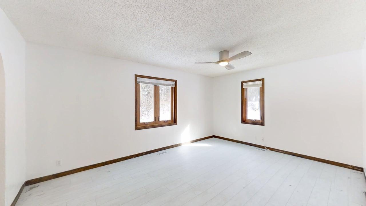 1756 West Ravina Park Road Decatur, IL 62526 - Photo 22 of 47 an empty room with a window
