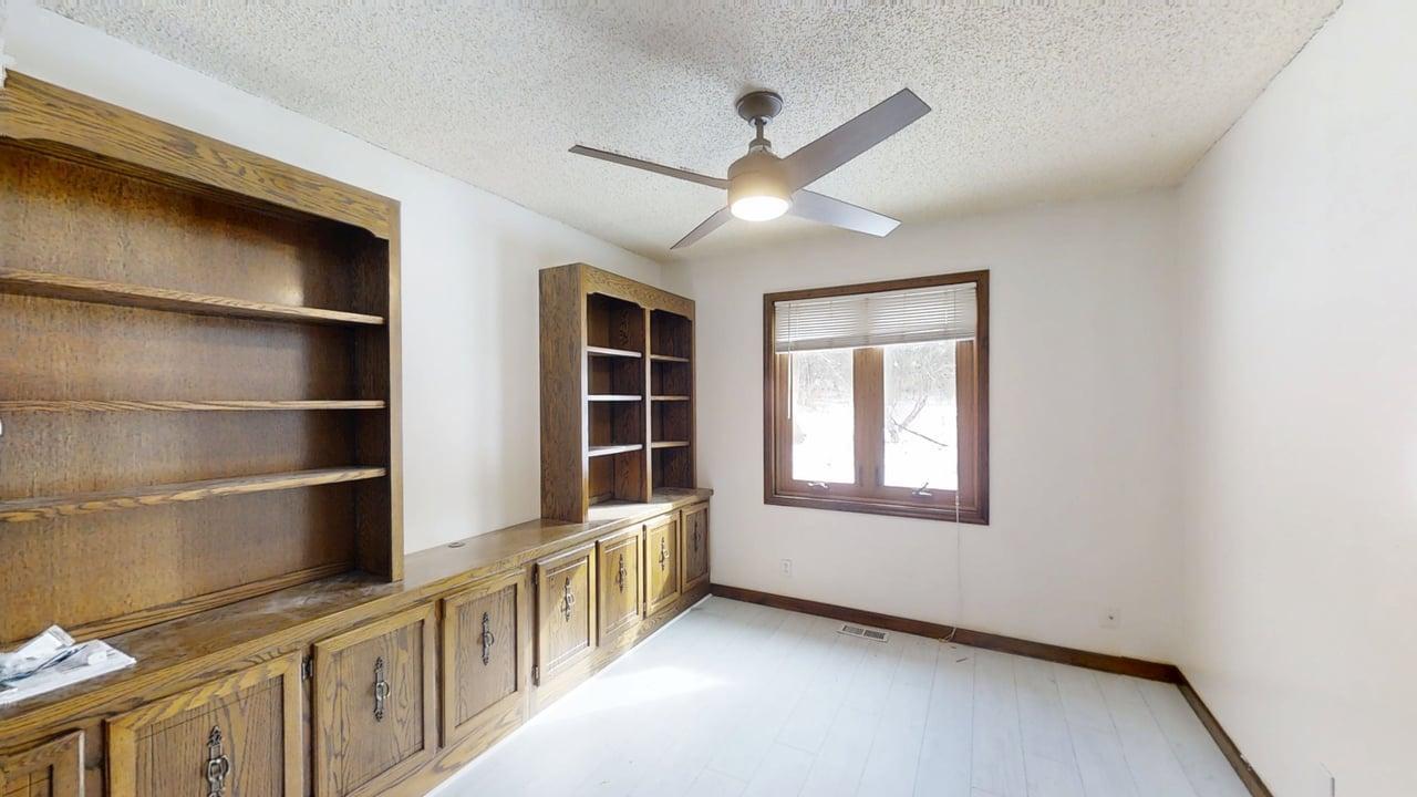 1756 West Ravina Park Road Decatur, IL 62526 - Photo 28 of 47 a view of an empty room with a window