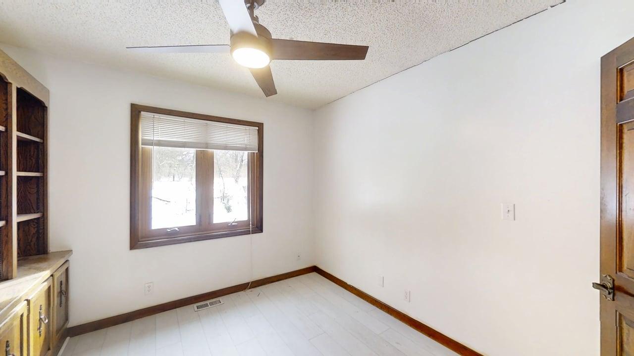 1756 West Ravina Park Road Decatur, IL 62526 - Photo 29 of 47 a view of an empty room with a window