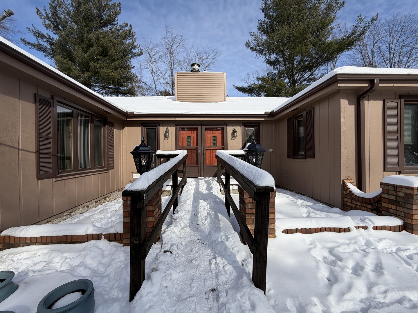 1756 West Ravina Park Road Decatur, IL 62526 - Photo 4 of 47 a front view of house with yard outdoor seating and covered with trees