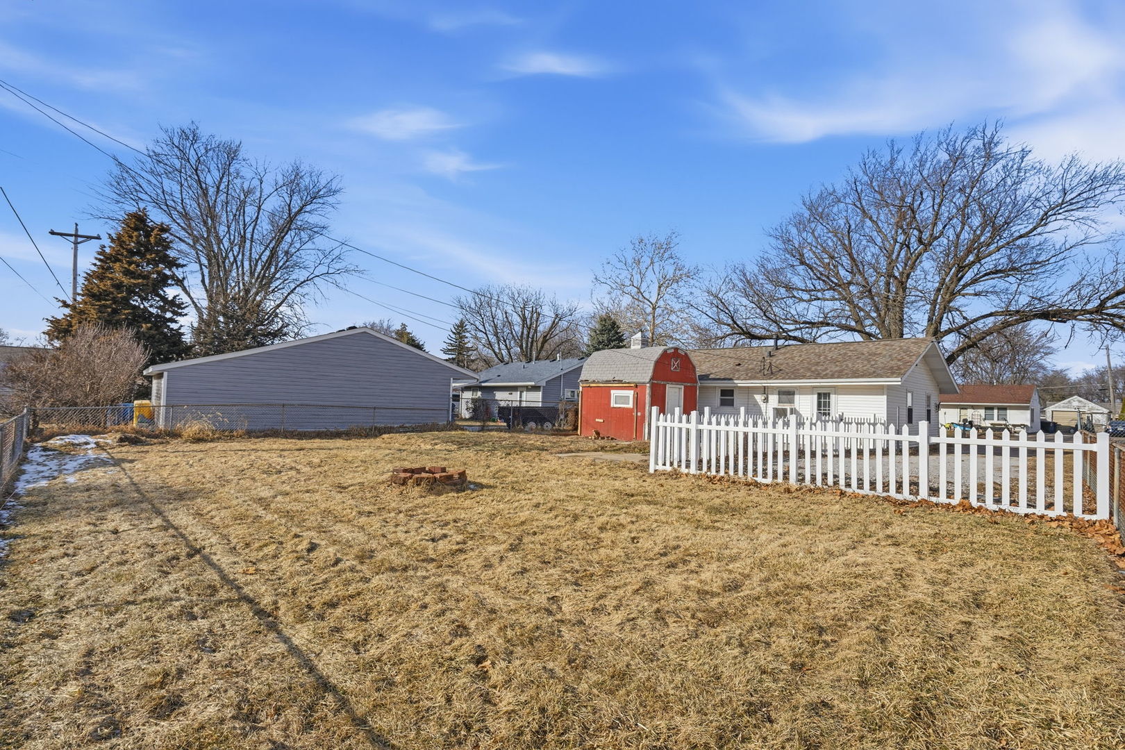 2515 West 69th Street Davenport, IA 52806 - Photo 15 of 15 a front view of a house with a yard