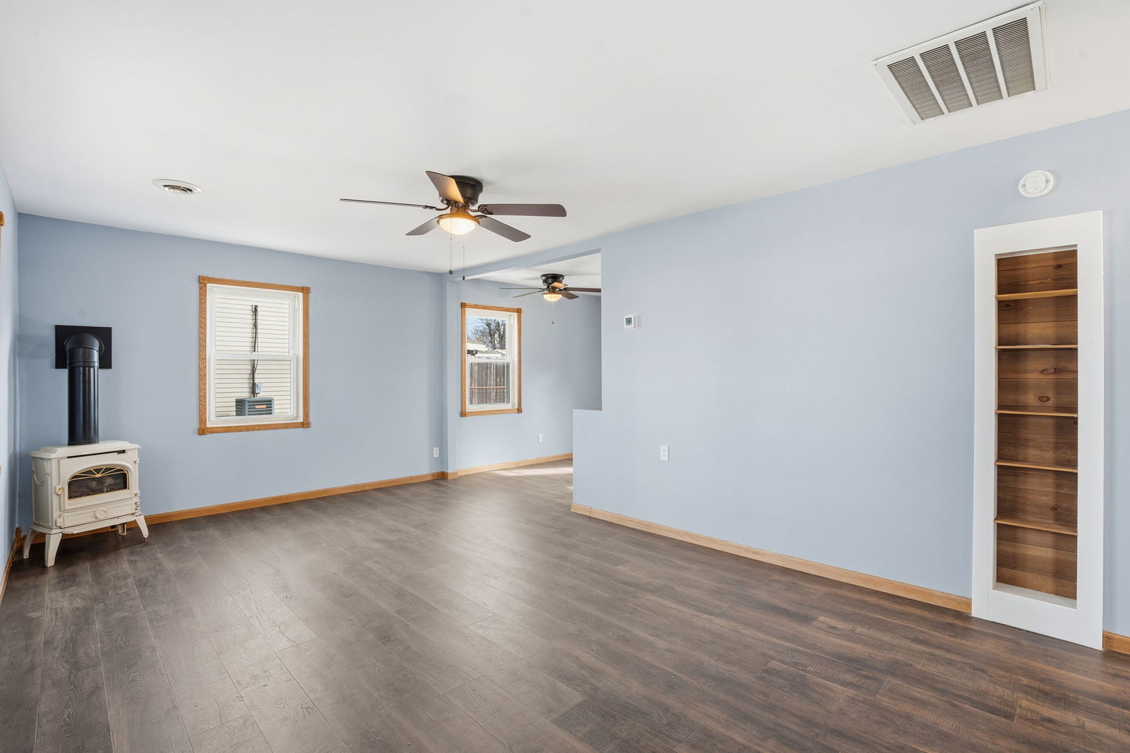 2515 West 69th Street Davenport, IA 52806 - Photo 4 of 15 wooden floor in an empty room with a window