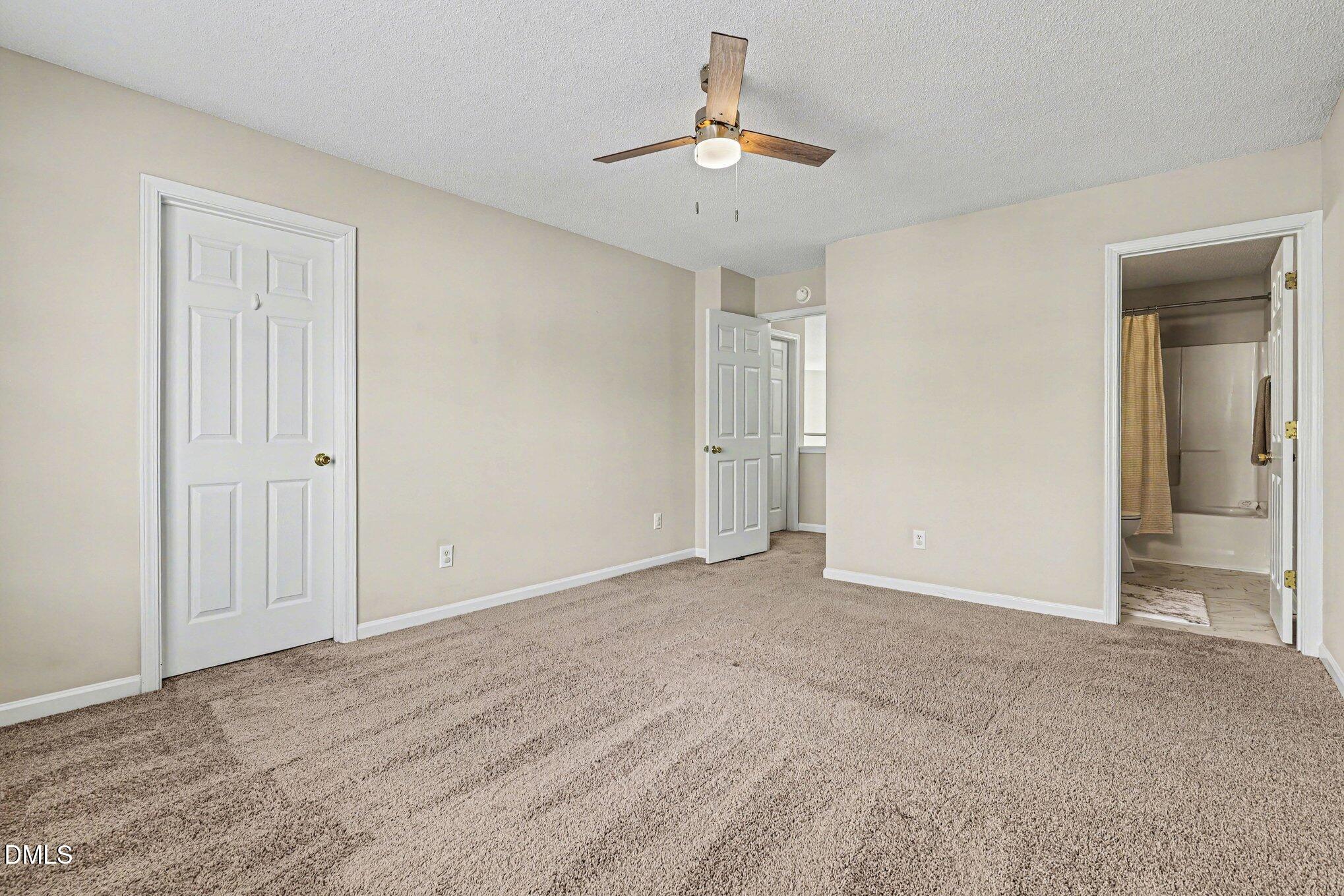 9904 Treymore Drive Raleigh, NC 27617 - Photo 15 of 33 a view of an empty room and window