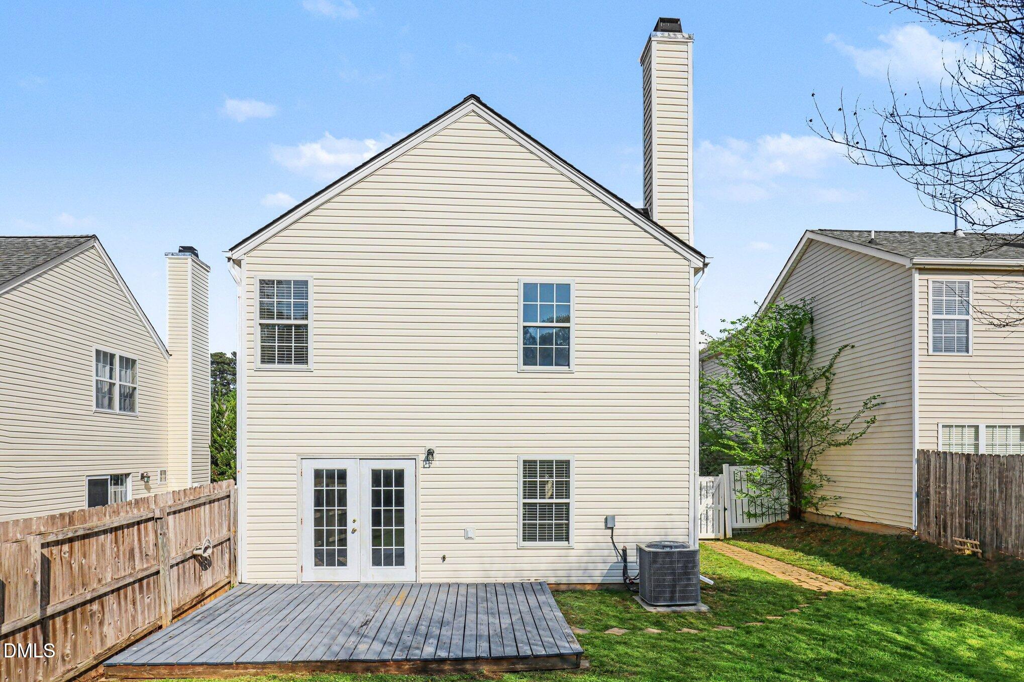 9904 Treymore Drive Raleigh, NC 27617 - Photo 24 of 33 a view of a house with a yard