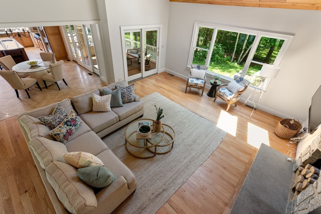 199 Bolton Road Harvard, MA 01451 - Photo 4 of 35 a living room with furniture and a large window