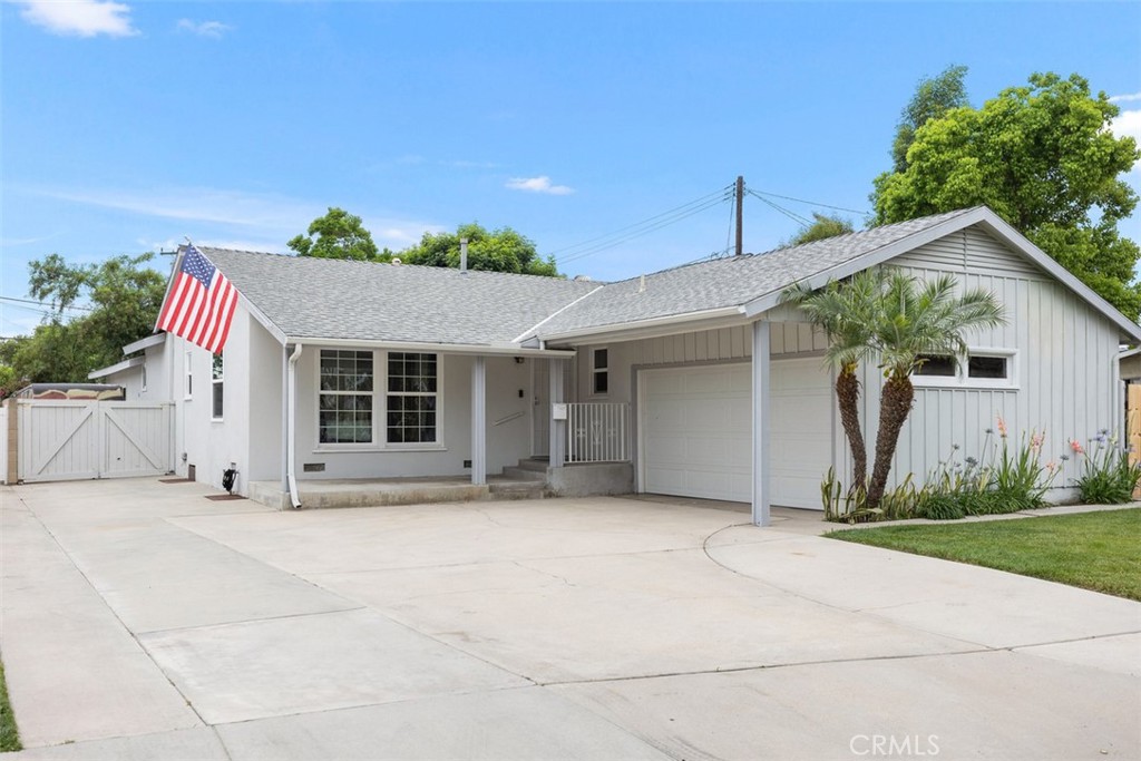 1509 South Jill Road Anaheim, CA 92804 - Photo 1 of 1 a view of a house with a yard and potted plants