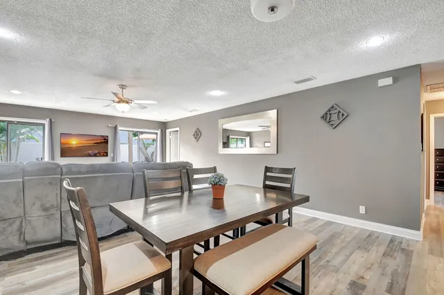 a view of a dining room with furniture