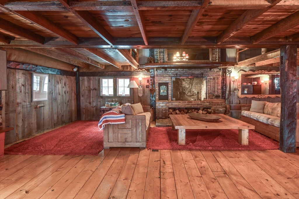 192 West Main Street Westborough, MA 01581 - Photo 11 of 42 a living room with lots of furniture and a chandelier