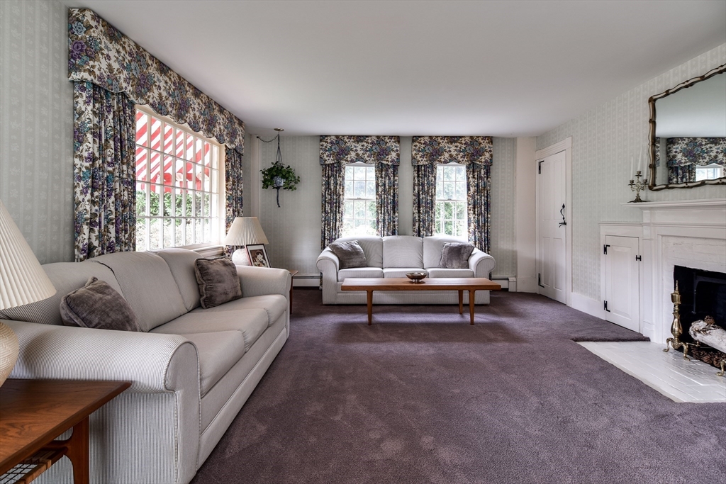 192 West Main Street Westborough, MA 01581 - Photo 13 of 42 a living room with furniture and a fireplace