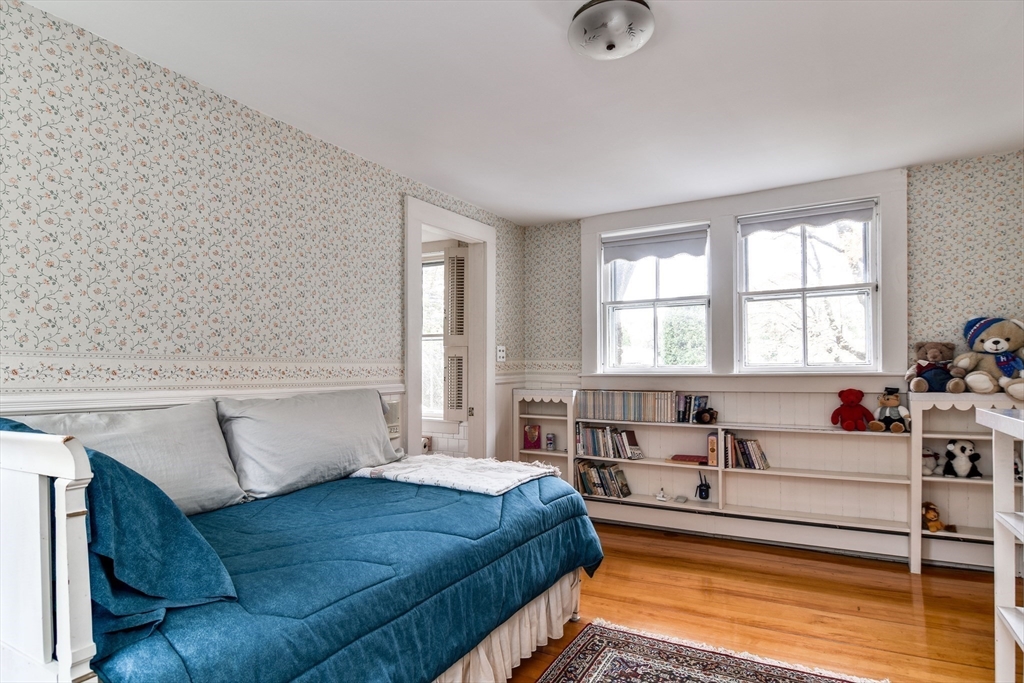 192 West Main Street Westborough, MA 01581 - Photo 21 of 42 a spacious bedroom with a bed and window