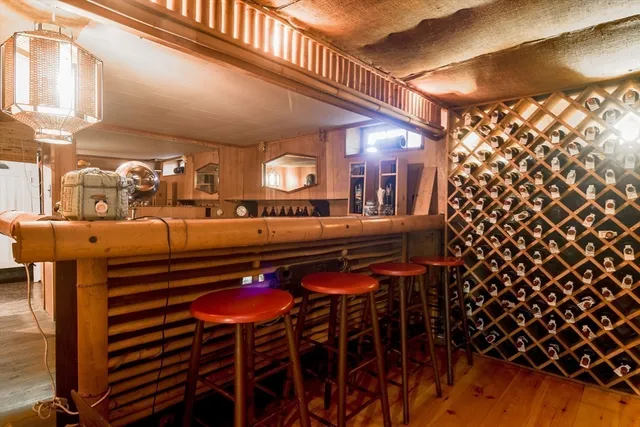 a view of a swimming pool with a yard