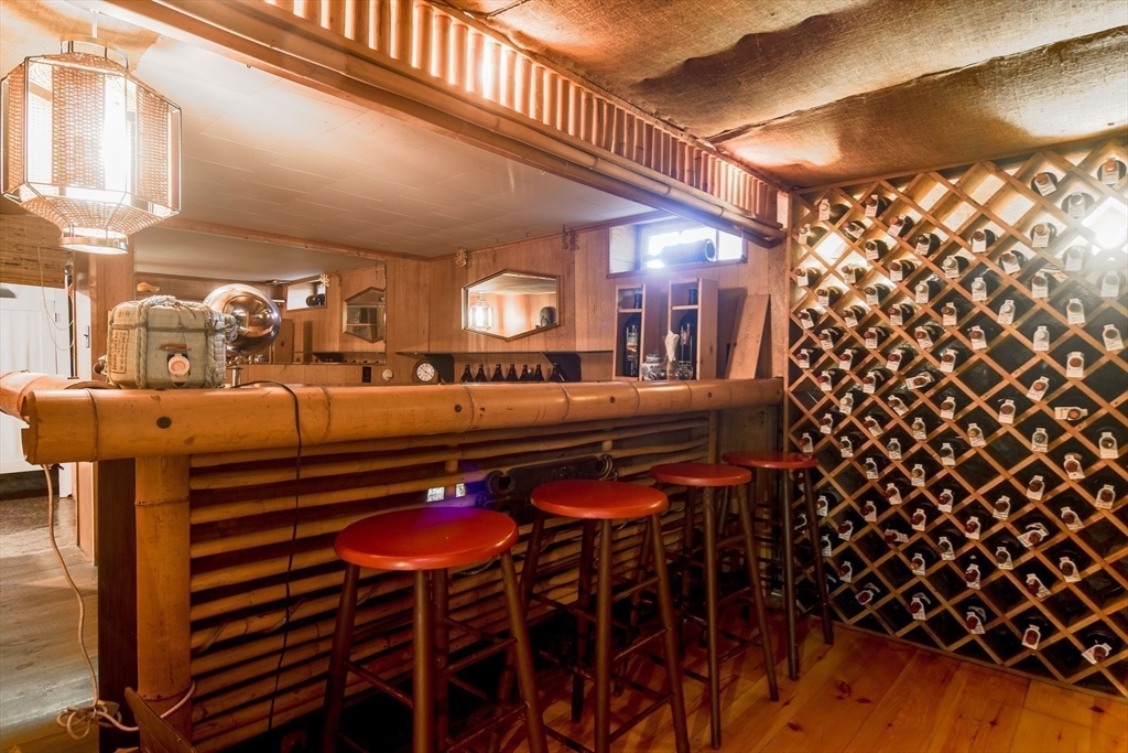192 West Main Street Westborough, MA 01581 - Photo 26 of 42 a kitchen with granite countertop a sink and a chair