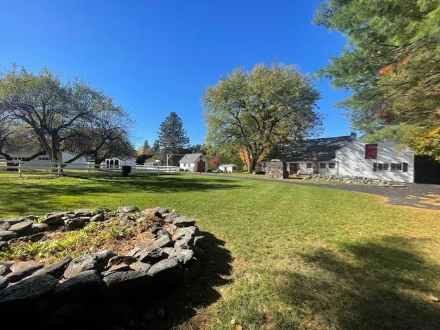 a view of backyard with outdoor space