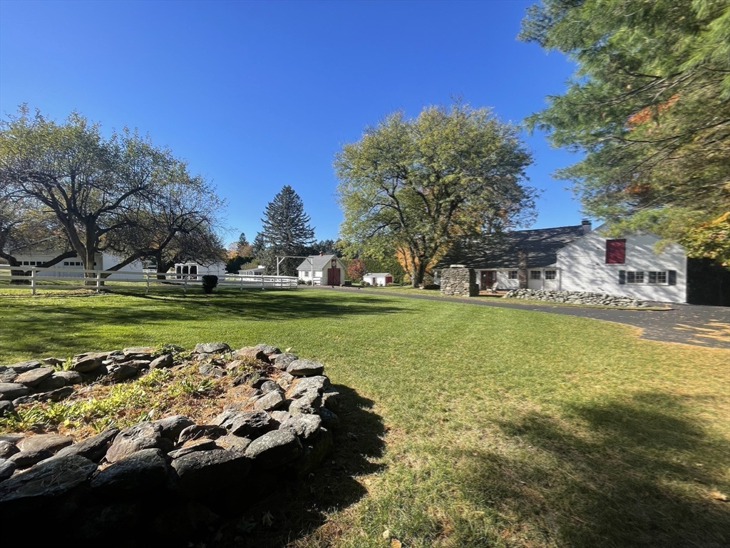 192 West Main Street Westborough, MA 01581 - Photo 28 of 42 a view of a swimming pool with a yard