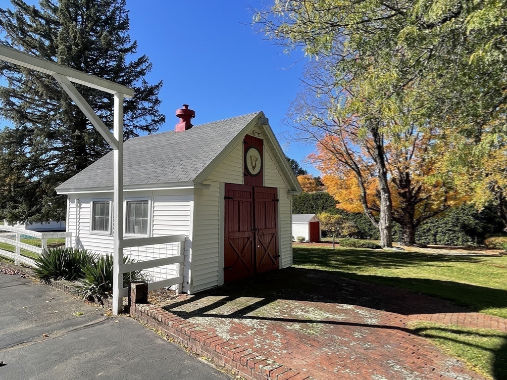 192 West Main Street Westborough, MA 01581 - Photo 32 of 42 a front view of a house with a yard