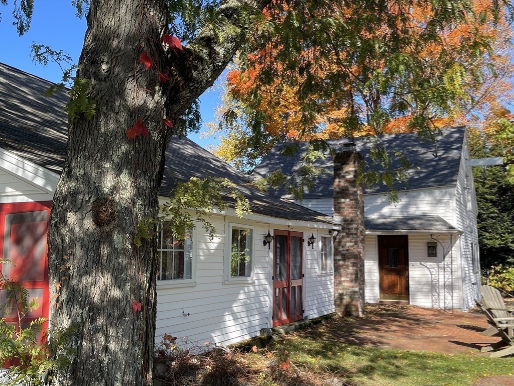 192 West Main Street Westborough, MA 01581 - Photo 37 of 42 a front view of a house with a tree