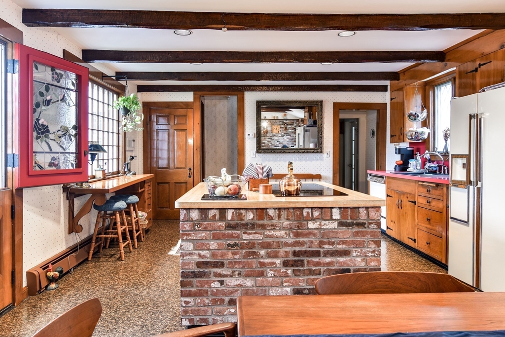 192 West Main Street Westborough, MA 01581 - Photo 8 of 42 a living room with furniture a window and a table