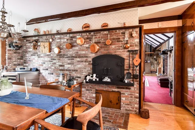 a living room with lots of furniture and a chandelier