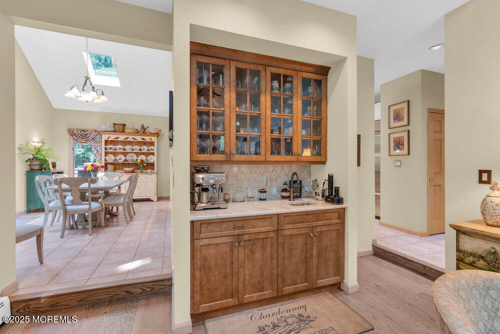 203 Stone Hill Road Freehold, NJ 07728 - Photo 28 of 83 a living room with furniture a rug and white walls