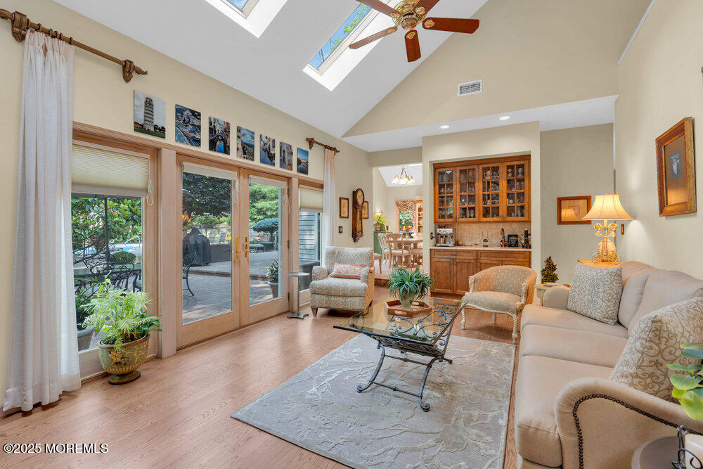 203 Stone Hill Road Freehold, NJ 07728 - Photo 30 of 83 a living room with furniture and a large window