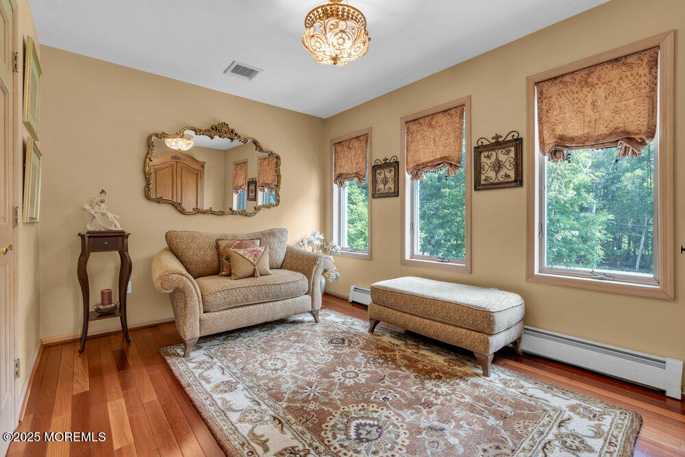203 Stone Hill Road Freehold, NJ 07728 - Photo 35 of 83 a living room with furniture and a window