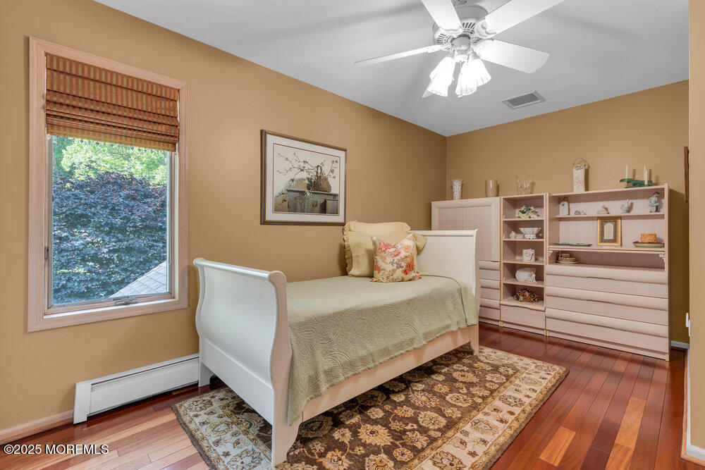 203 Stone Hill Road Freehold, NJ 07728 - Photo 43 of 83 a bedroom with a bed and a window