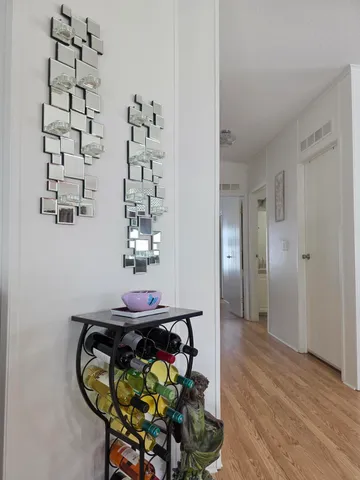 a bed room with a bed and a dresser