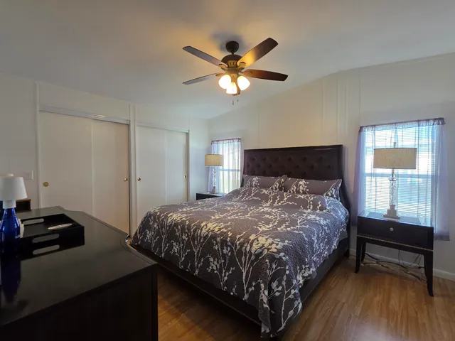 a bathroom with a sink vanity and toilet