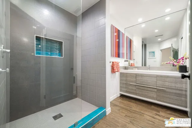 a bathroom with a sink and a shower