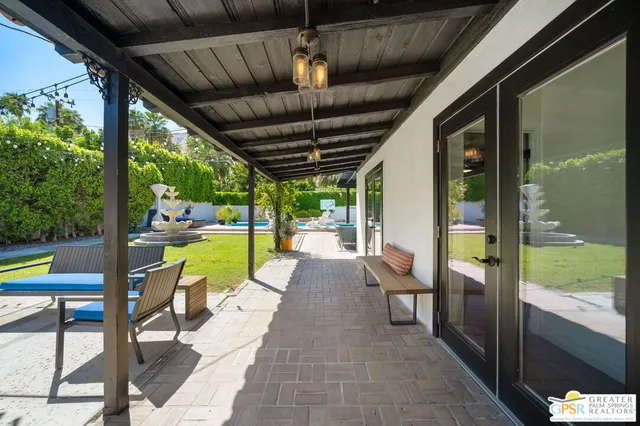 a view of swimming pool with patio