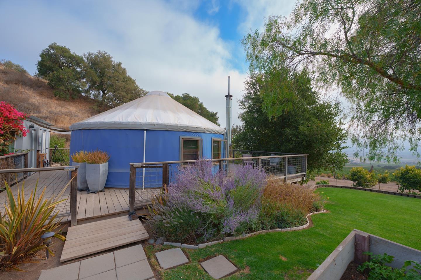 0 River Road Salinas, CA 93908 - Photo 17 of 35 a front view of a house with garden