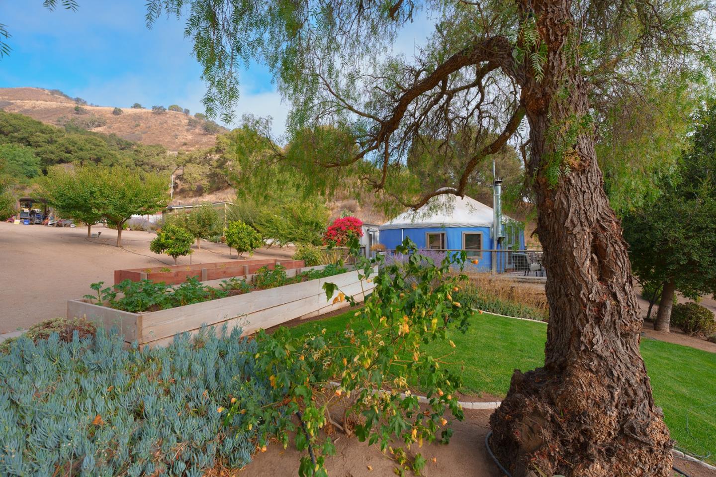0 River Road Salinas, CA 93908 - Photo 22 of 35 a front view of a house with a yard and mountain