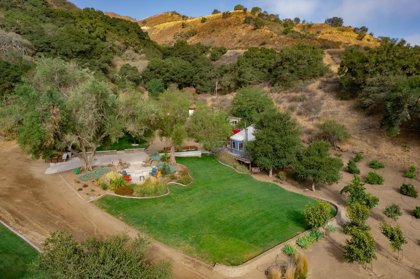 0 River Road Salinas, CA 93908 - Photo 3 of 35 a view of a backyard with plants and a mountain
