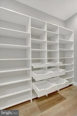 a view of washer and dryer with kitchen countertops