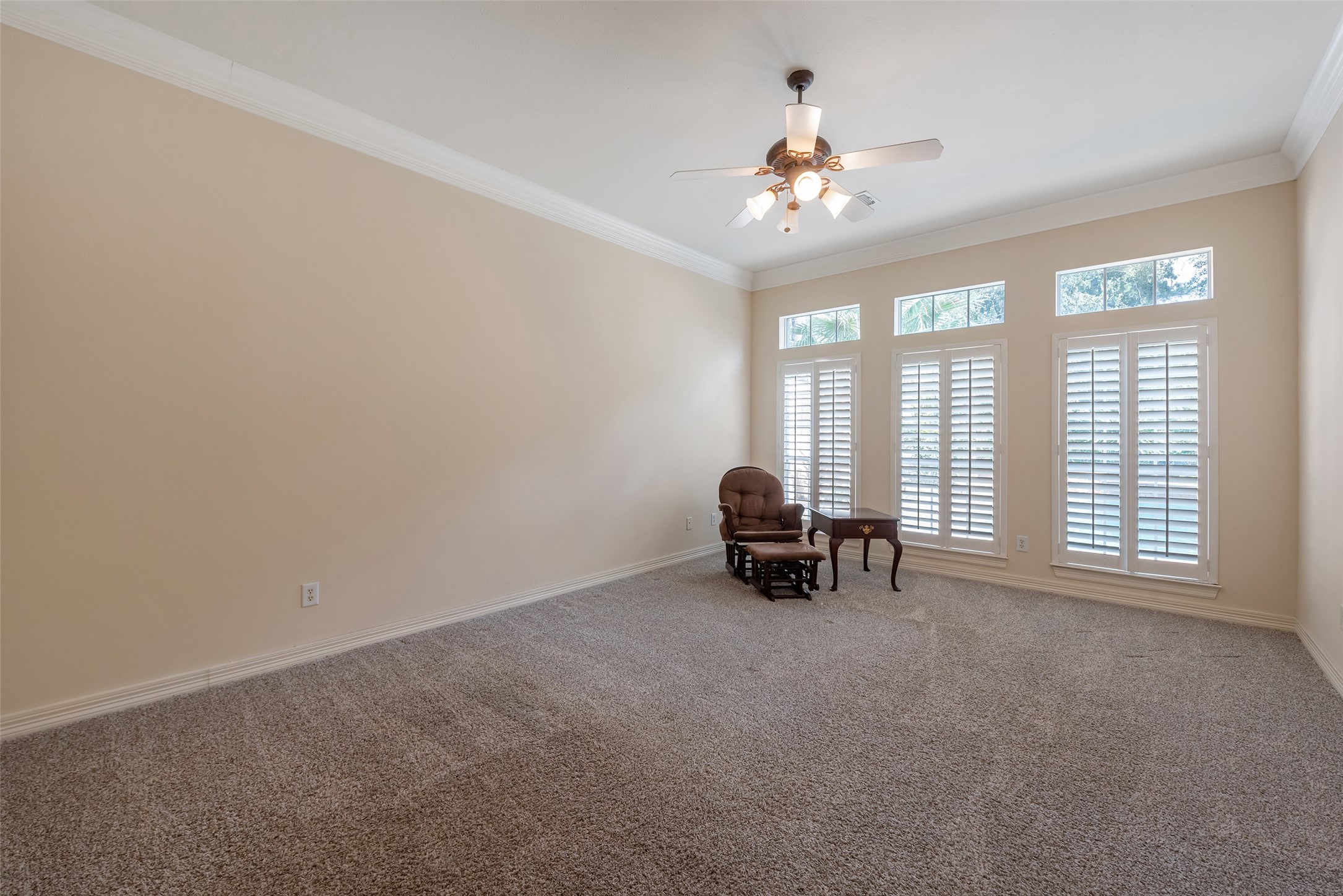 15306 Beecham Drive Houston, TX 77068 - Photo 17 of 48 Wake up in the morning with a view through the sweeping windows of the backyard pool and the trees beyond.