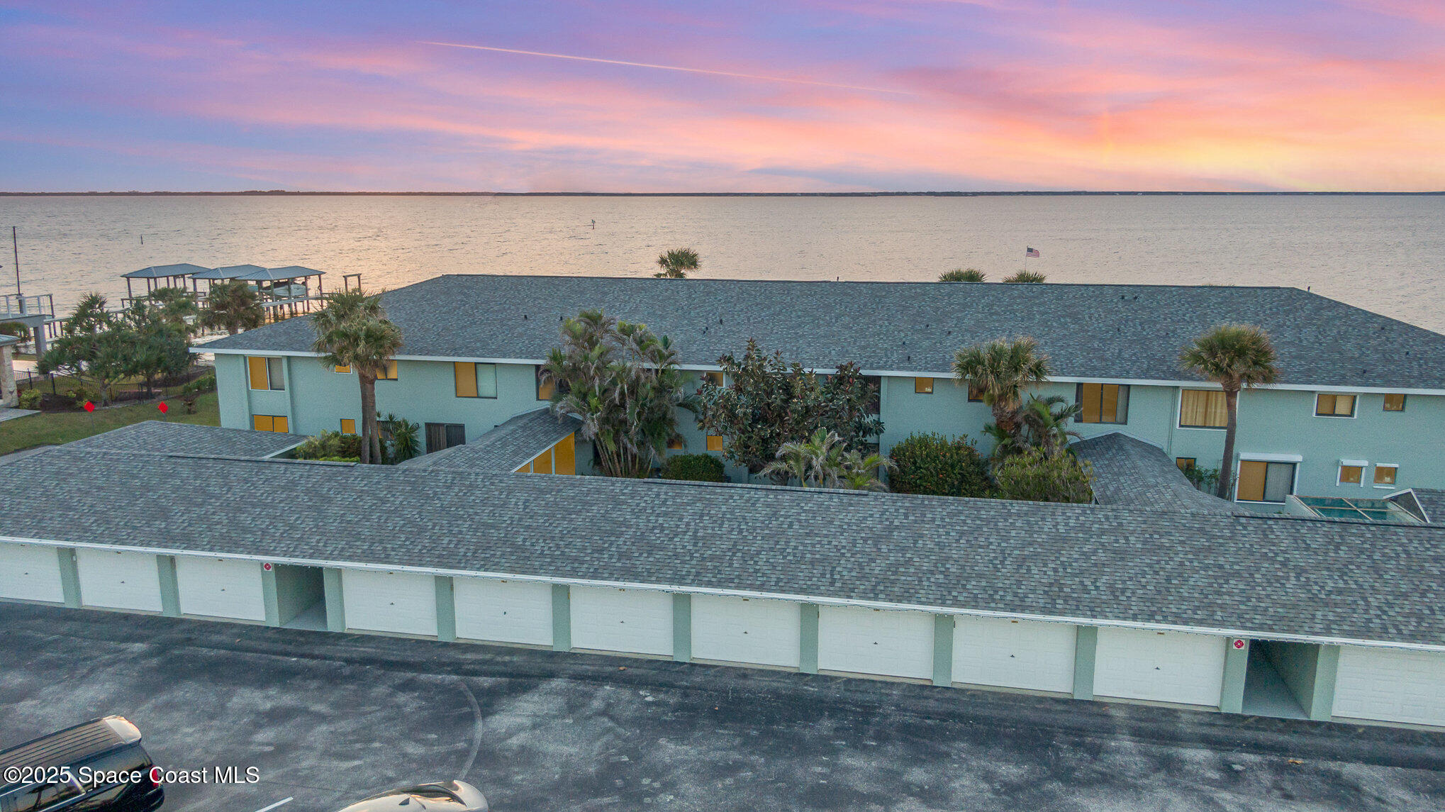 3100 South Atlantic Avenue, Unit 204 Cocoa Beach, FL 32931 - Photo 1 of 28 an aerial view of multiple house
